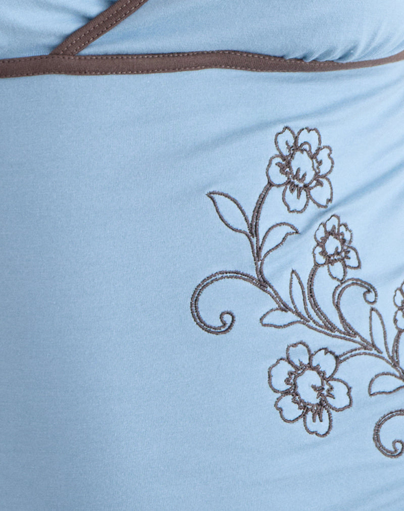 Liuvia Top in Nantucket Blue with Coffee Quartz Binding and Flower Embroidery