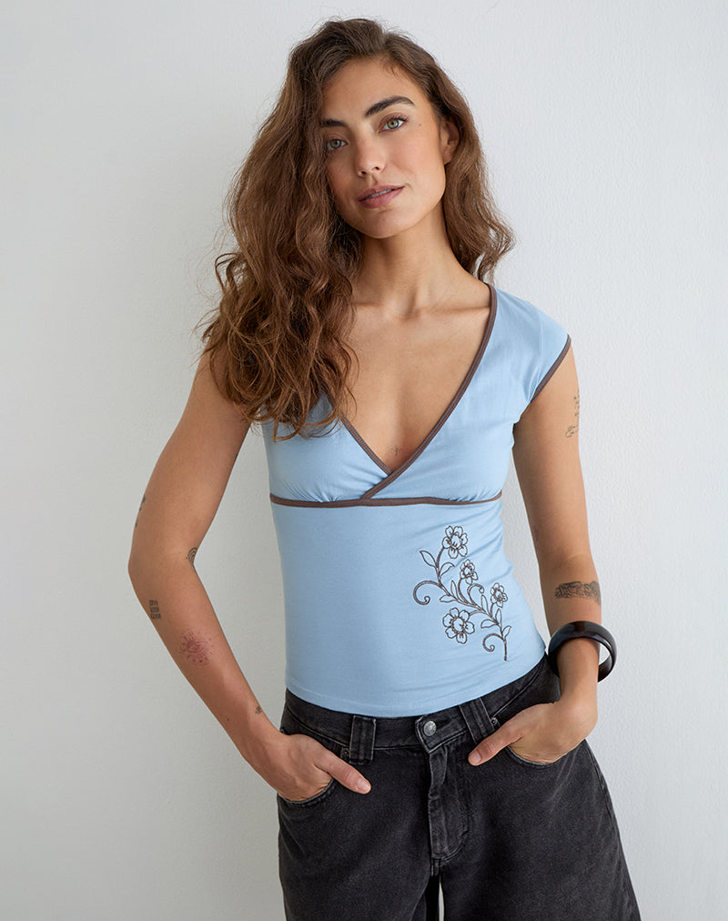 Liuvia Top in Nantucket Blue with Coffee Quartz Binding and Flower Embroidery