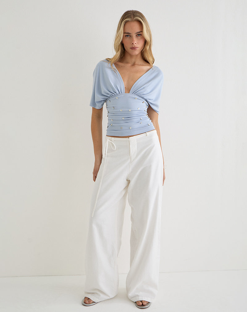 Vernia Plunge Batwing Top in Lyocell Dusty Blue with Pearl Buttons